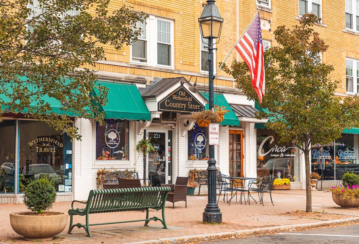 Shops and a bench on Main Street in Old Wethersfield